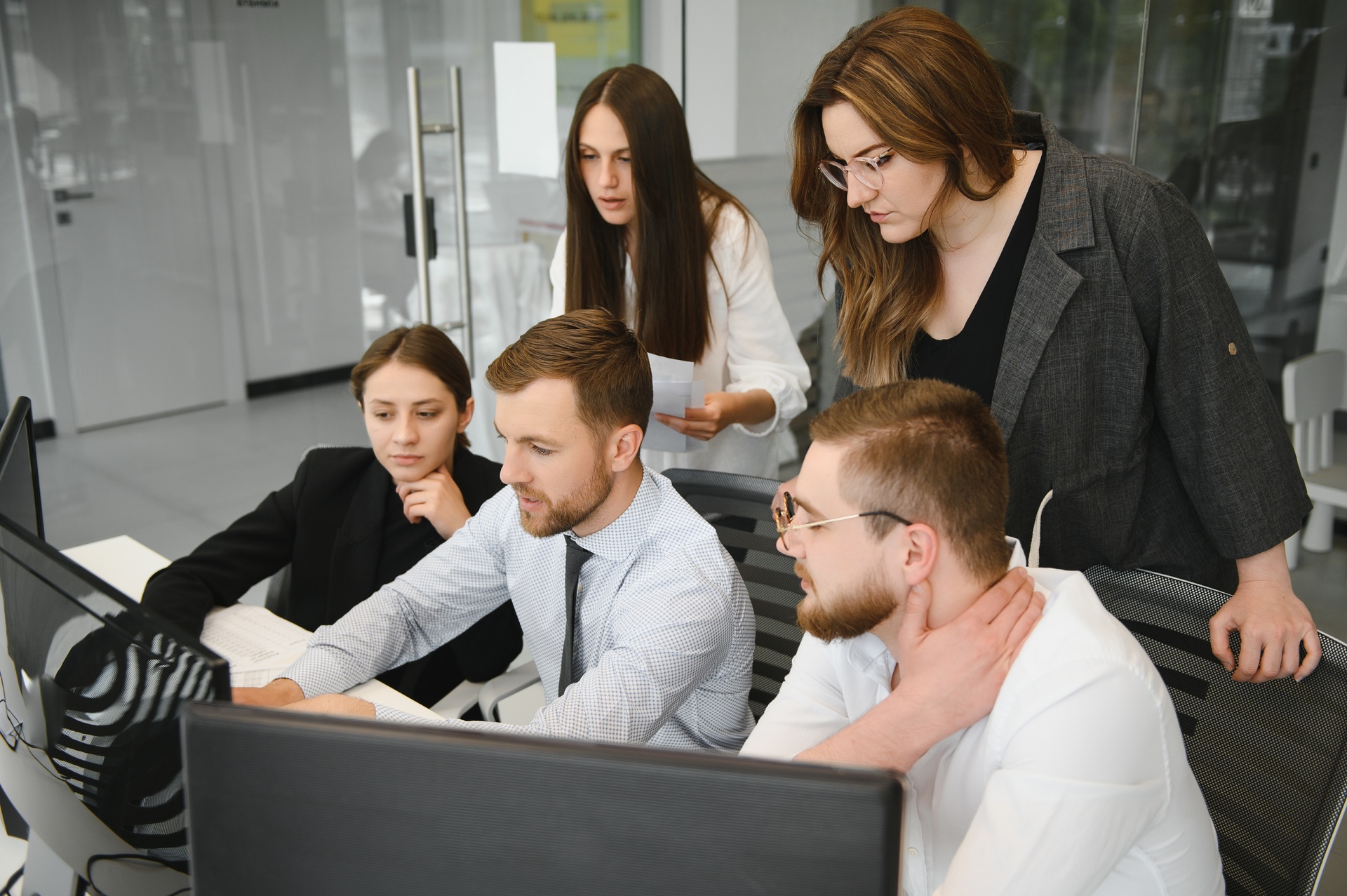 Group of businessmen and businesswomen stock brokers working at office. Group of businessmen and businesswomen stock brokers working at office